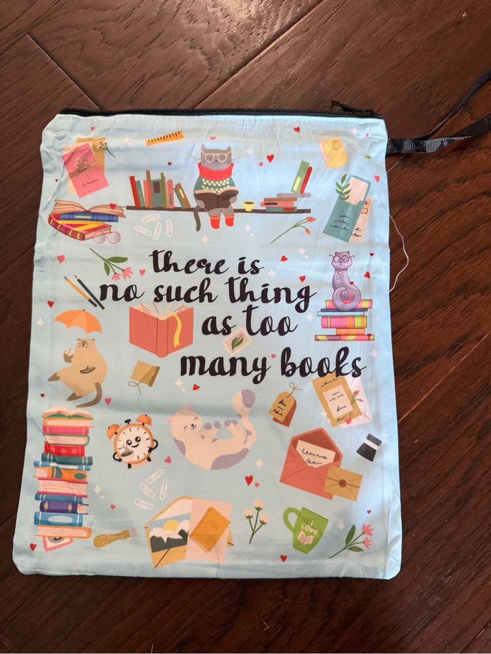 Book sleeve "There Is No Such Thing As Too Many Books"